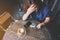 An Asian woman get stressed and broke while holding credit card with mobile phone on the table