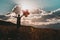 Asian woman on grassland with colored balloons