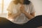 Asian woman with hand in praying position,Female prayer hands clasped together