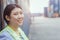 Asian woman happy dock worker control loading containers cargo at shipyard. Marine and carrier staff manager employee. cargo