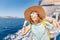 asian woman in hat enjoying travel and vacation on Cruise ship. Tourist girl on the deck