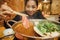 Asian woman have shabu style dinner for winter season