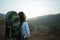 Asian woman hiker alone in the top mountains