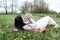 Asian woman holding healthy Lovely bunny easter fluffy rabbits on green field. The Easter hares.