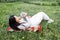 Asian woman holding healthy Lovely bunny easter fluffy rabbits on green field. The Easter hares.