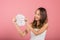 Asian woman holding purifying mask face on hands