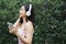 Asian woman listen to music using wireless headphone
