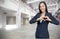 asian woman make heart synbol on logistic business