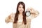 Asian woman in pajamas with toothbrush and clock