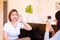 Asian woman patient deaf hearing talking with specialist sign language and showing hands gesture