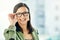 Asian woman, portrait and glasses for consultant in office, optometry and eye care in office. Female person, happy