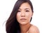 Asian woman, portrait and white background with soft skin for beauty, smile and cosmetics for skincare or routine