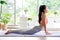 Asian woman practice yoga, body stretch exercise at home, Young asia girl doing up dog, yoga posture, in the morning , exercise at