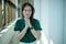 Asian woman praying morning near the window at church, Hands folded in prayer concept for faith, spirituality and religion, Church