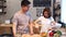 Asian woman prepare salad food in the kitchen. Beautiful happy asian couple are cooking in the kitchen.