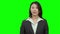 Asian woman presenting on Green Screen