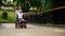 Asian woman pushing excited mature lady wheelchair, happy aged patient, health