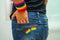 Asian woman with rainbow flag, LGBT symbol rights and gender equality, LGBT Pride Month in June, LGBTQ, LGBTI, LGBTQA, LGBTQIA