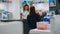 Asian woman reading cardiology pills leaflet to buy medicaments in pharmacy shop