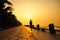 Asian woman running seaside morning