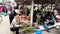 Asian woman selling betel nut at market