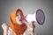 Asian woman Shouting with Megaphone