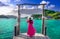 Asian woman standing on Wooden bridge at Nangyuan island in south of Thailand