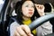 Asian Woman Struggles to Drive with Blurry Vision and Prohibited Eyeglasses