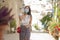 Asian woman touring in Andalusia Spain during covid19 - young happy and beautiful Chinese girl in face mask enjoying holidays