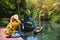 Asian woman travel nature. Travel relax.a boat photo. Sitting watching the beautiful nature at tha pom-klong-song-nam. Krabi, in