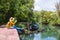 Asian woman travel nature. Travel relax.a boat photo. Sitting watching the beautiful nature at tha pom-klong-song-nam. Krabi, in