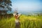 Asian woman travel nature. Travel relax. Standing natural touch grass on the Mountain at Khao-Khoâ€Ž. travel Thailand