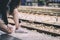 Asian woman traveler has tying shoe laces for traveling by train