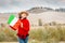 asian woman travels in Tuscany with Italian flag
