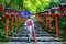 Asian woman wearing japanese traditional kimono at  Kifune Shrine in Kyoto, Japan.