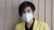 Asian woman wearing mask tired angry and upset with situation Covid-19 outbreak and world pollution