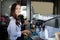 Asian women Barista smiling and using coffee machine in coffee shop counter - Working woman small business owner food and drink