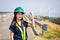 Asian women engineer stands confidently at outdoor on site power plant energy