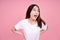 Asian women feel â€œWow` shocked and promotions on a pink background