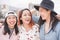 Asian women friends having fun outdoor - Happy trendy girls laughing together - Millennial generation, bonding, friendship and