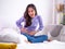 Asian women have severe stomach pain. Women have menstrual cramps in the morning after waking up. Concept stomach cramps, menstrua