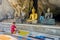 Asian women pilgrim worships the Buddha statues at cave of Wat Tham Khao Wong