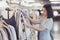 Asian women shopping some dresses in the shopping center