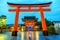 Asian women in traditional japanese kimonos at Fushimi Inari Shrine in Kyoto, Japan