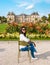 Asian women visiting Le Jardin Luxembourg park in Paris during summer in the city of Paris France