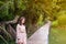 Asian women walk on wooden bridges