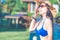 Asian women wearing bikini swimwear on the wooden terrace,swimming pool.