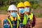 Asian workers wear protective face masks for safety in Construction site