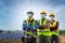 Asian workers wear protective face masks for safety in Construction site Electricity Solar power industry, Natural energy, New
