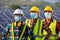 Asian workers wear protective face masks for safety in Construction site Electricity Solar power industry, Natural energy, New